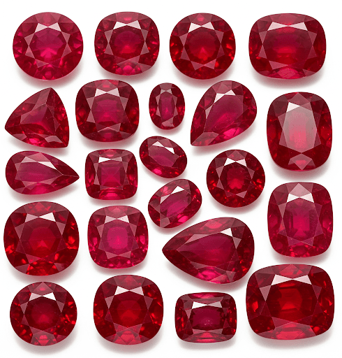 Two dozen faceted rubies in mixed cuts, from deep crimson to bright red, the birthstone for July.